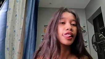 A Slender Asian Girl With A Small Frame